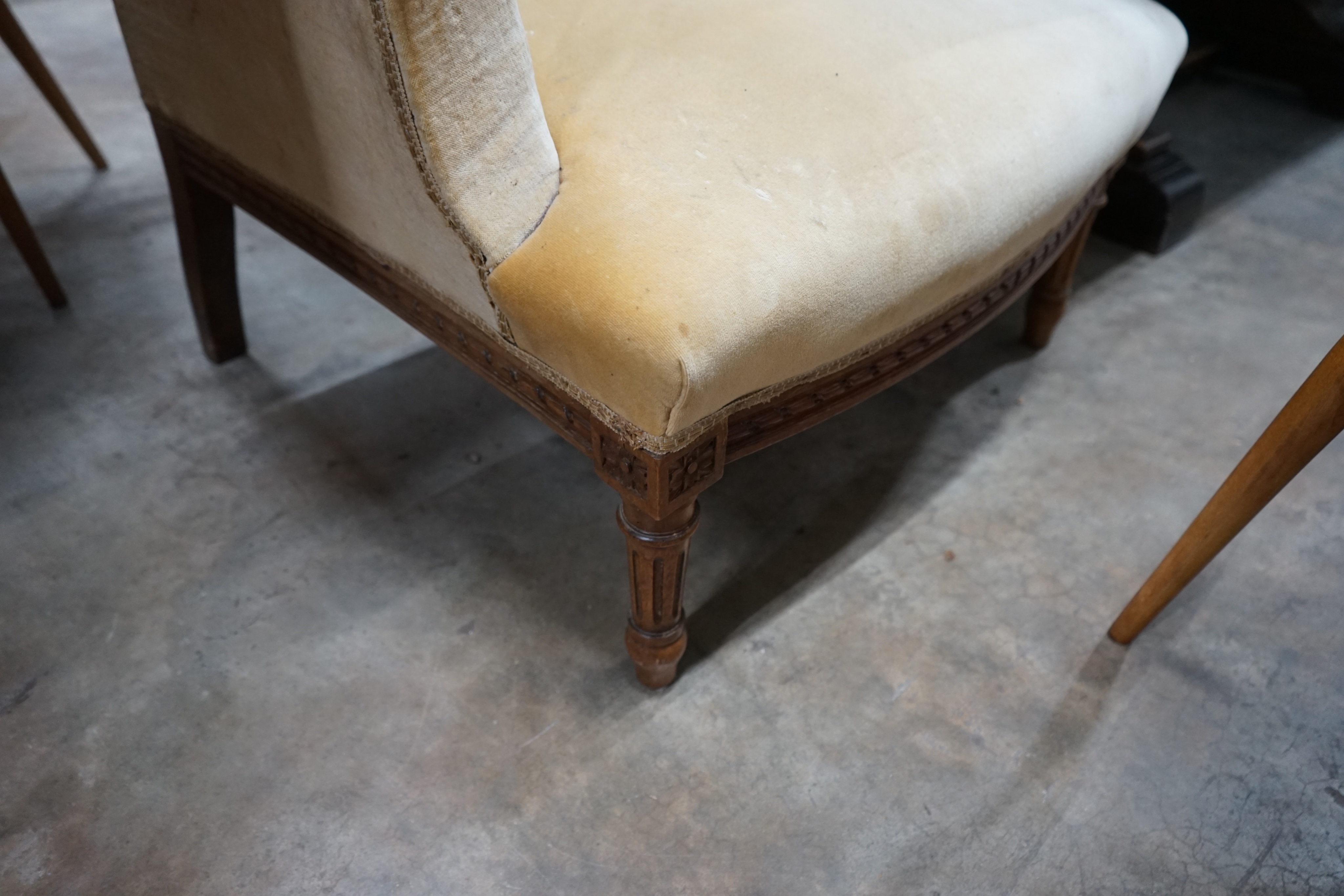 A late 19th century French carved beech upholstered armchair, width 80cm depth 70cm height 96cm